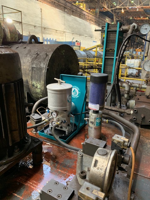 Portable oil filtration system in an industrial plant