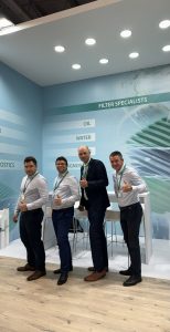 Four team members in front of the Filter Technik stand at MSV Brno 2024